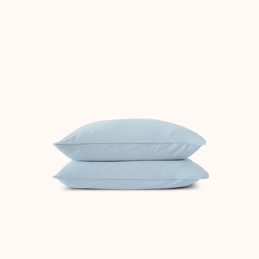 A set of blue / Afina pillowcases made from organic matte sateen, displayed on a plain background.